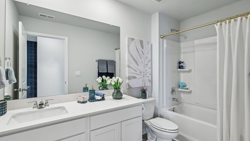 Bathroom with quartz countertops in new home