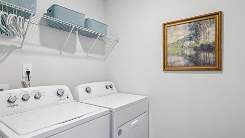 Laundry room in new single family home