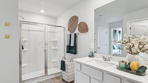 Bathroom with quartz countertops in new home
