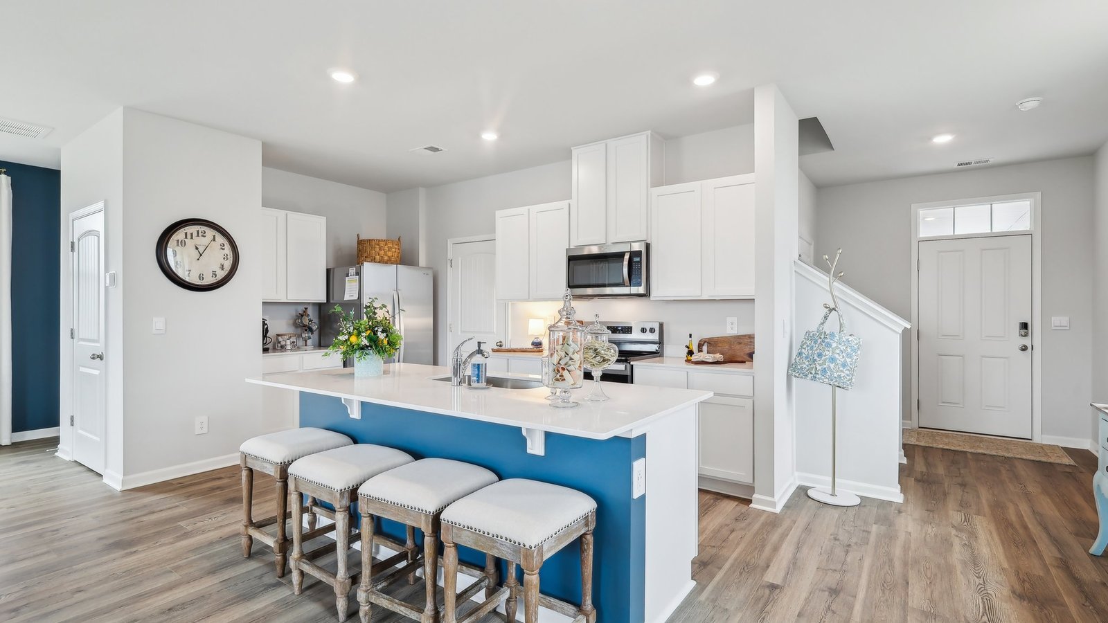 Modern kitchen with quartz countertops and stainless steel appliances