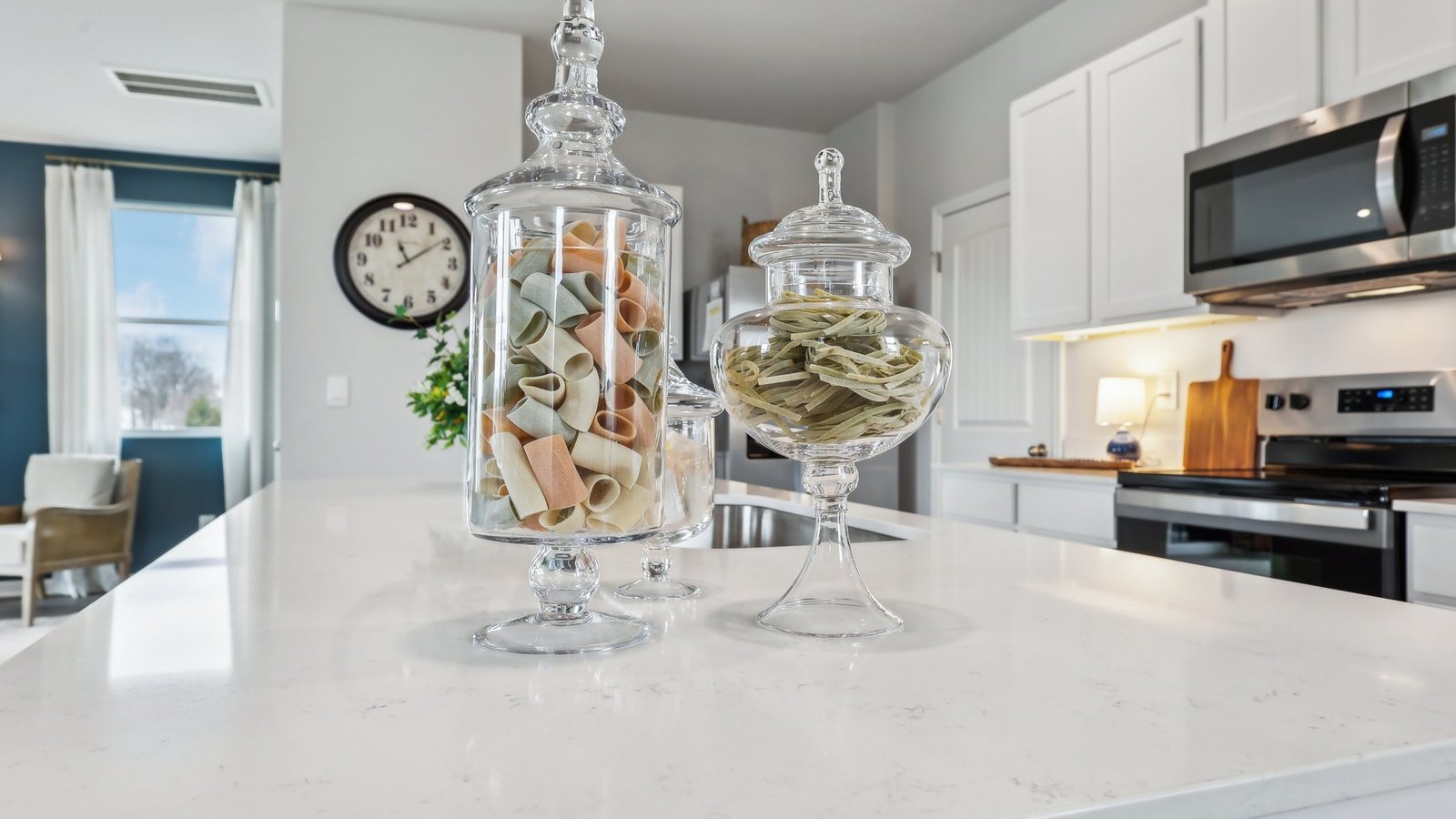 Modern kitchen with quartz countertops and stainless steel appliances