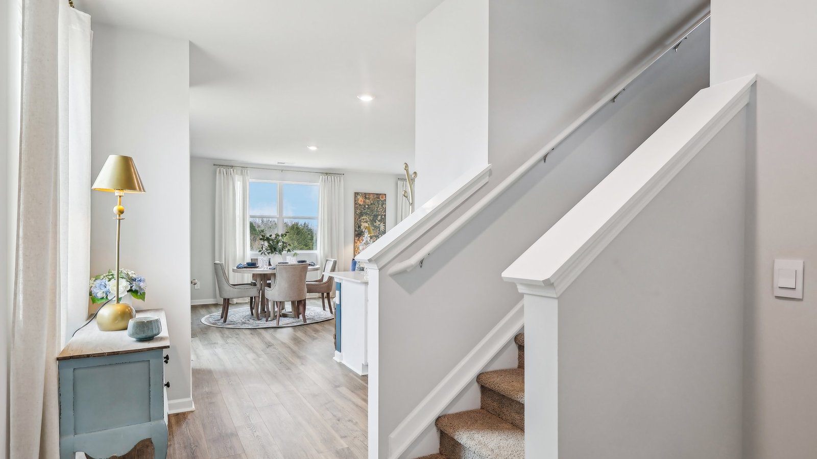 Entry to modern, open concept floorplan