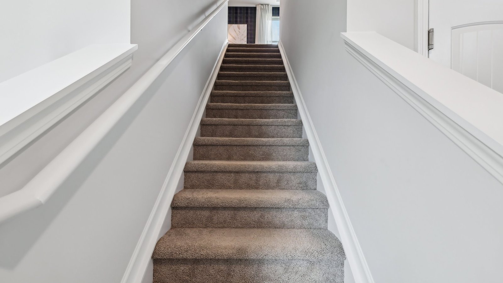 Entry to modern, open concept floorplan