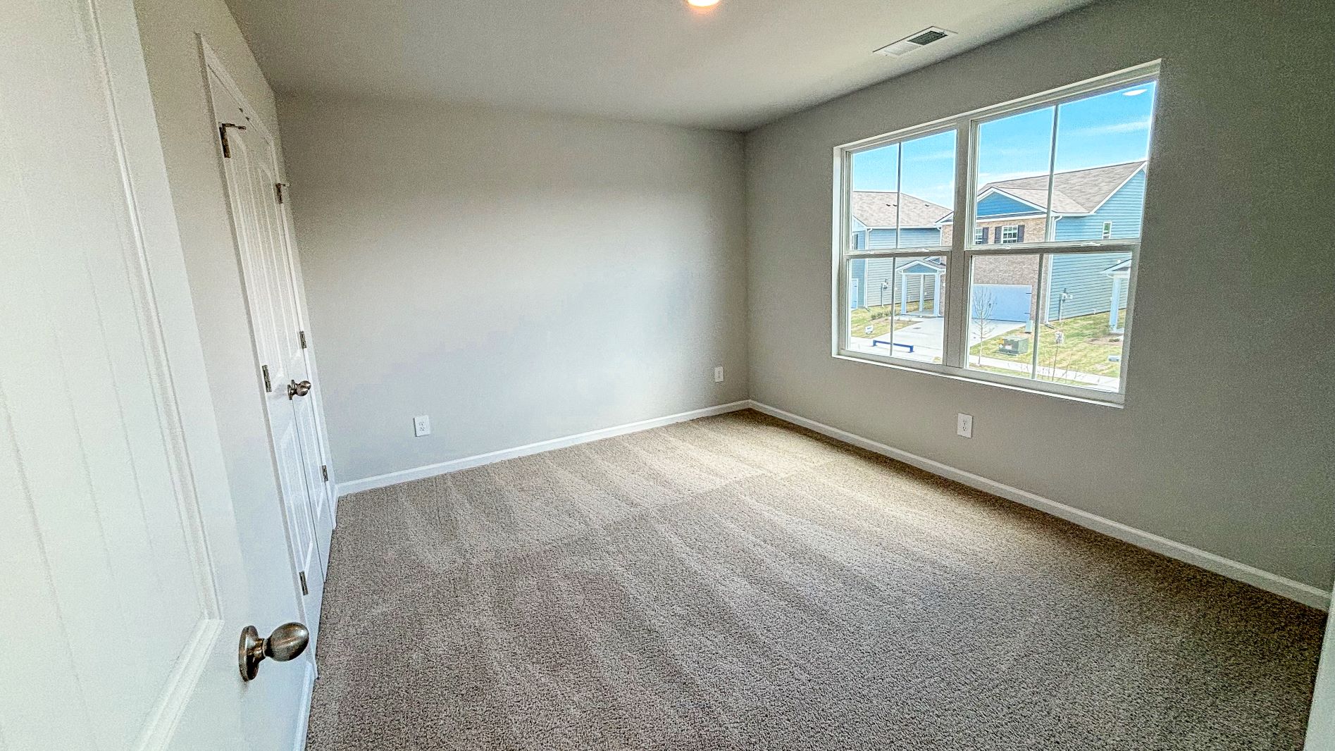 Bedroom with open windows