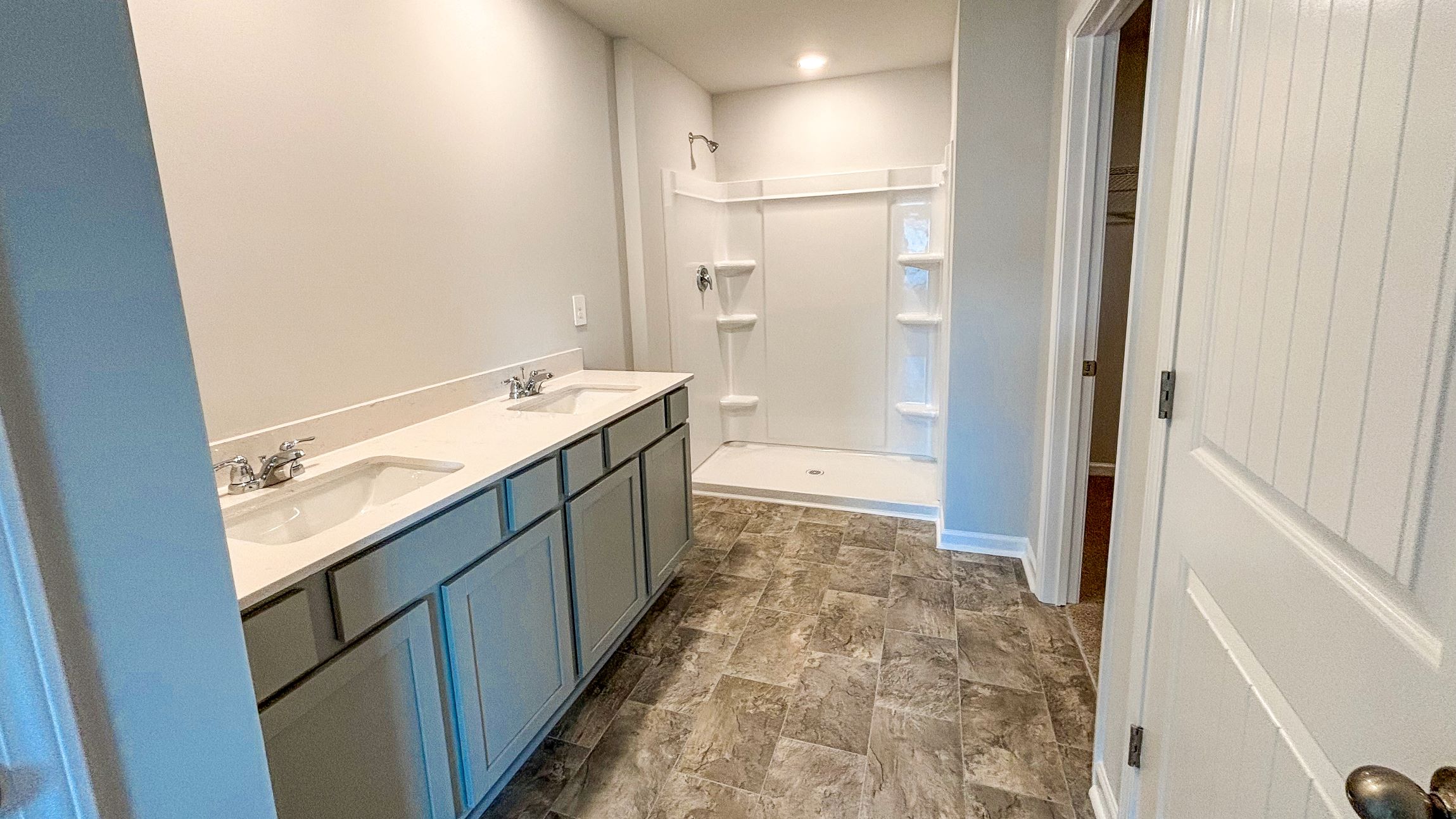 Primary bathroom with quartz countertoops