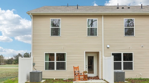 Back patio of new two story townhome
