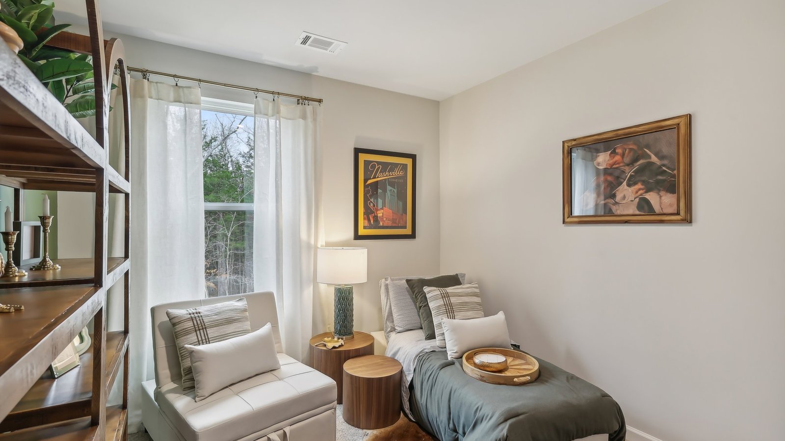 Secondary bedroom offers well-designed flexibility, ideal for sleeping space, a home office, or a fun game or hobby room