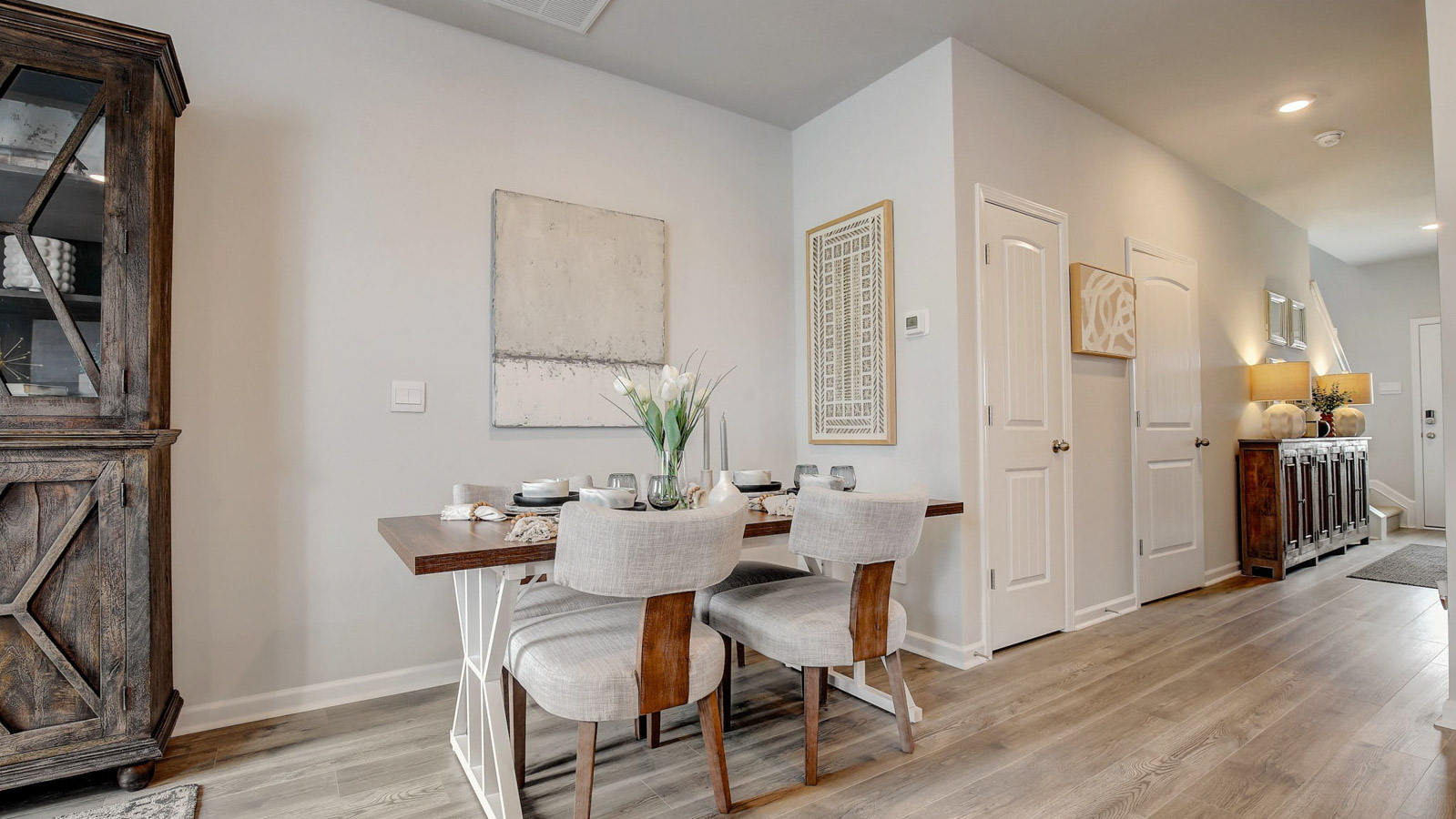 Front-facing dining room off the main entry in new D.R. Horton new construction home at Saddle Trace Townhomes