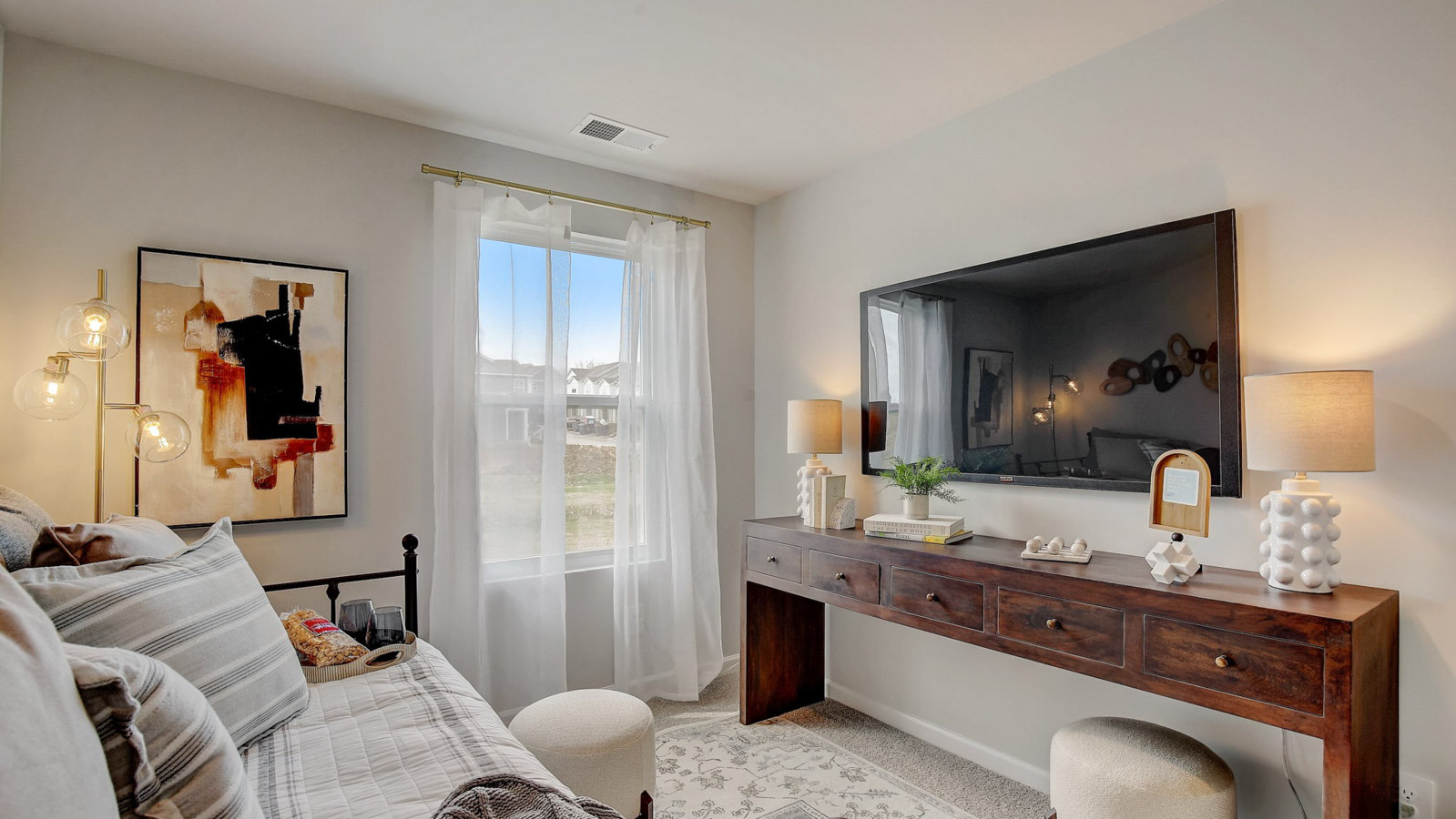 Secondary bedroom, flex-office, study, entertainment, game, craft room in this new construction D.R. Horton townhome