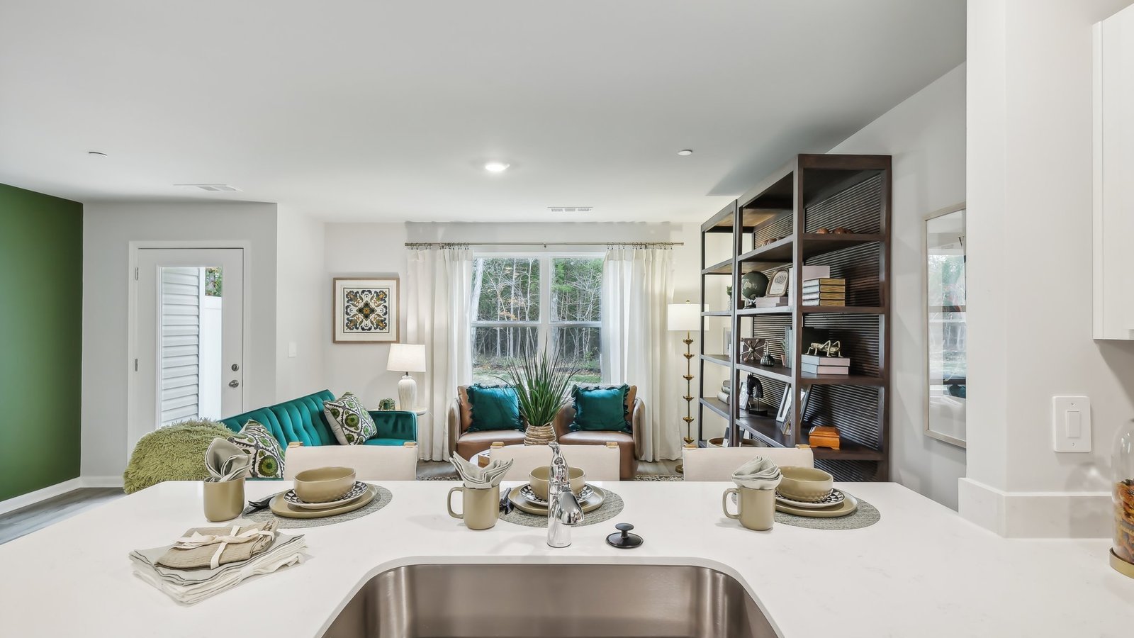 Open concept kitchen wit view of living area.