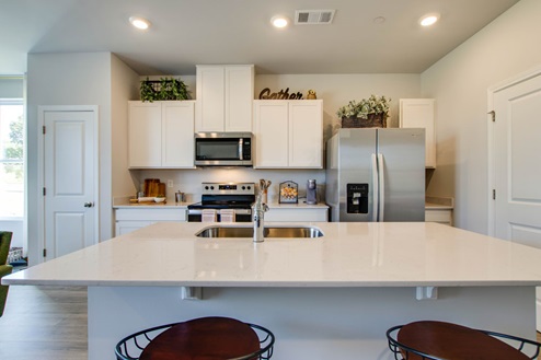 Townhome modern kitchen with quartz countertops