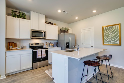 Townhome modern kitchen with quartz countertops