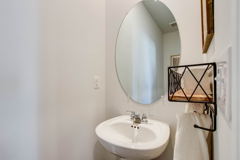 half bath in open concept floorplan new townhome