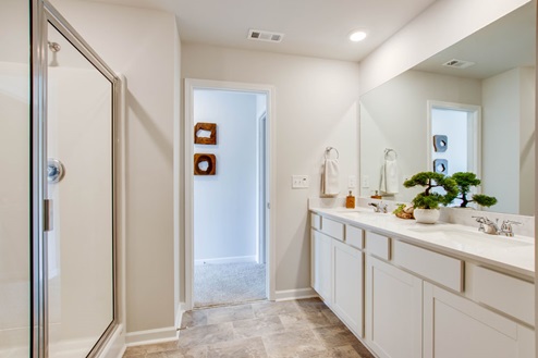 Bathroom with quartz countertops in new, modern townhome