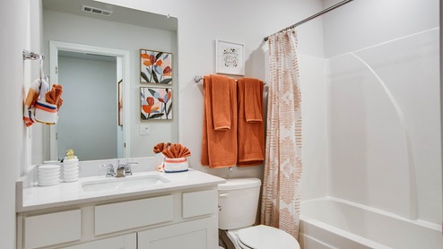 Bathroom with quartz countertops in new, modern townhome