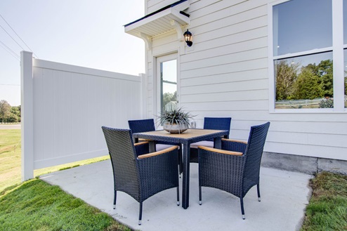 Outside sitting area back porch in town story townhome in lewisburg