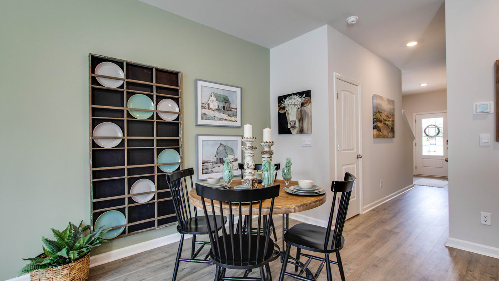 Front-facing dining room off the main entry in new D.R. Horton new construction townhome at King's Landing