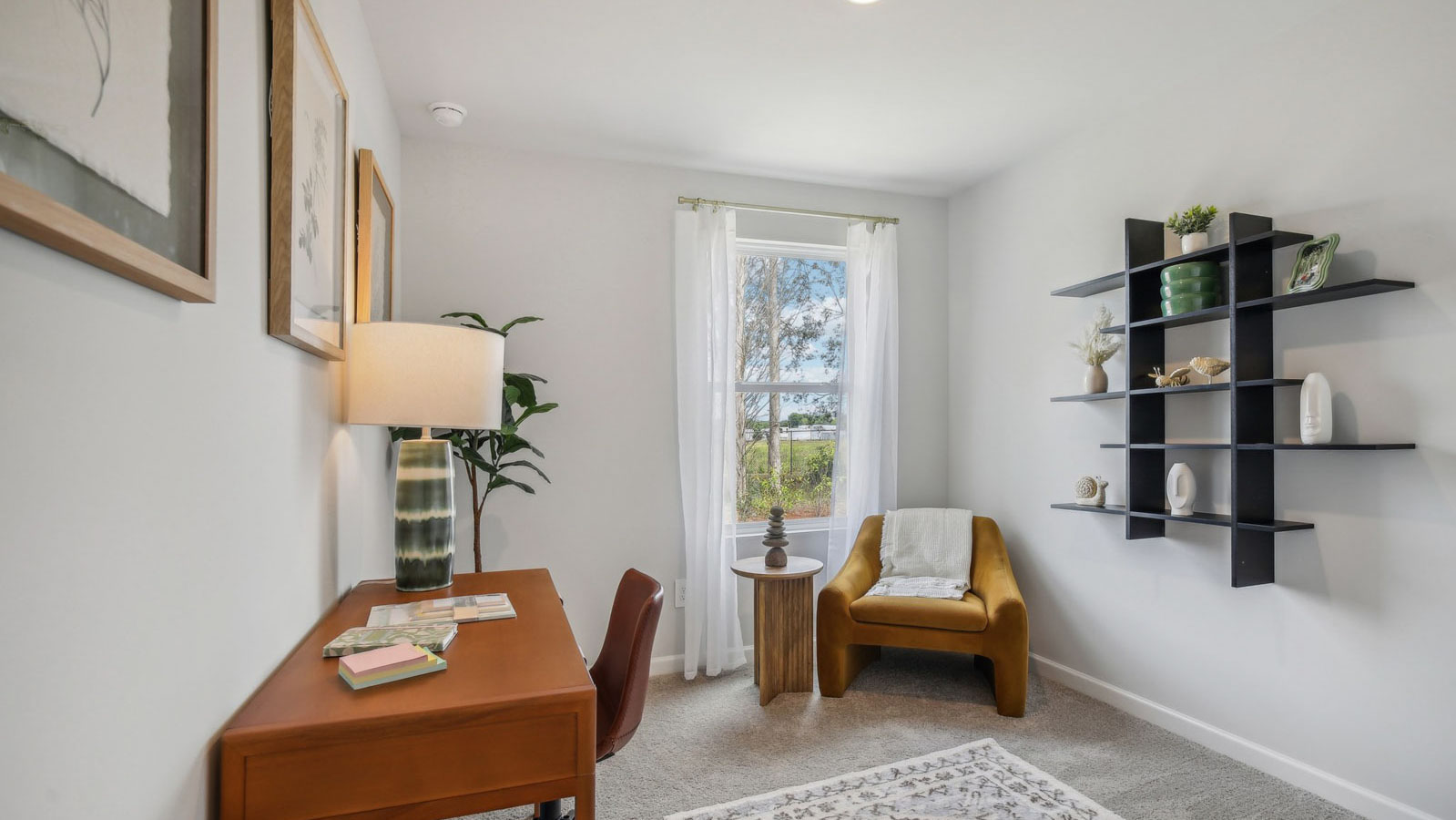 Third bedroom in King's Landing showcases quality designs with closet space, soft window light, upstairs connectivity