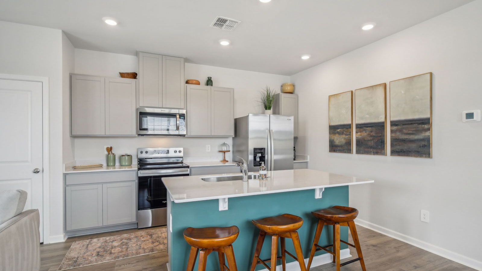 Central kitchen island with sink, seating, crafted to anchor the home, pantry, prep zones, perfect for entertaining and everyday gathering