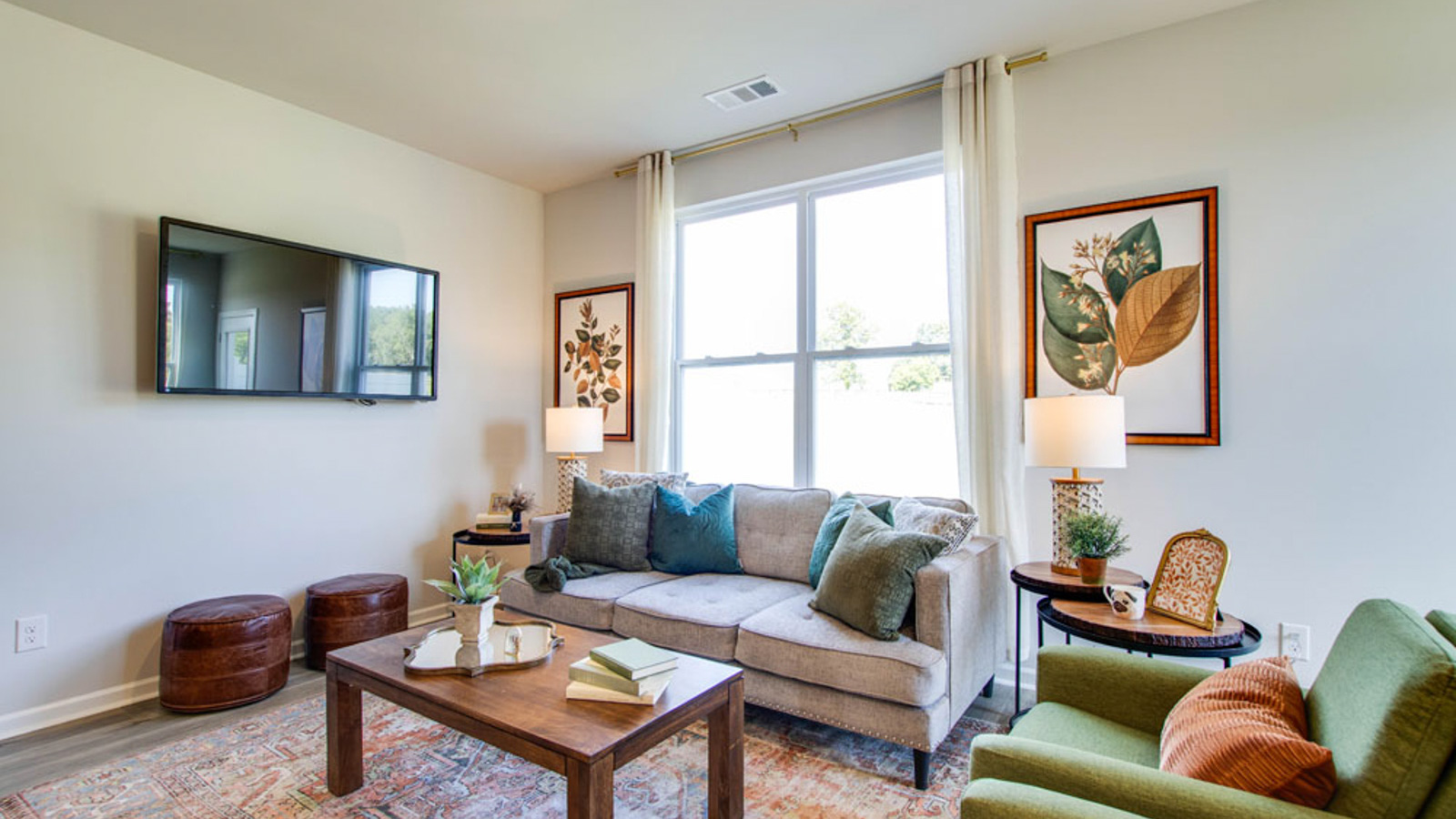 Living room built for daily living, entertaining with ample space, near front foyer, adding stylish open design