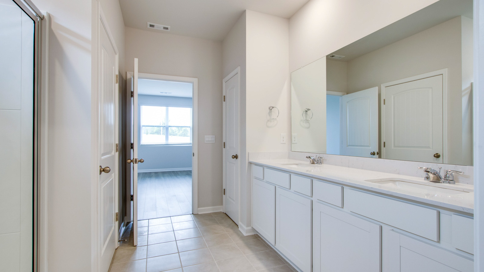 Bathroom with quartz countertops in new home