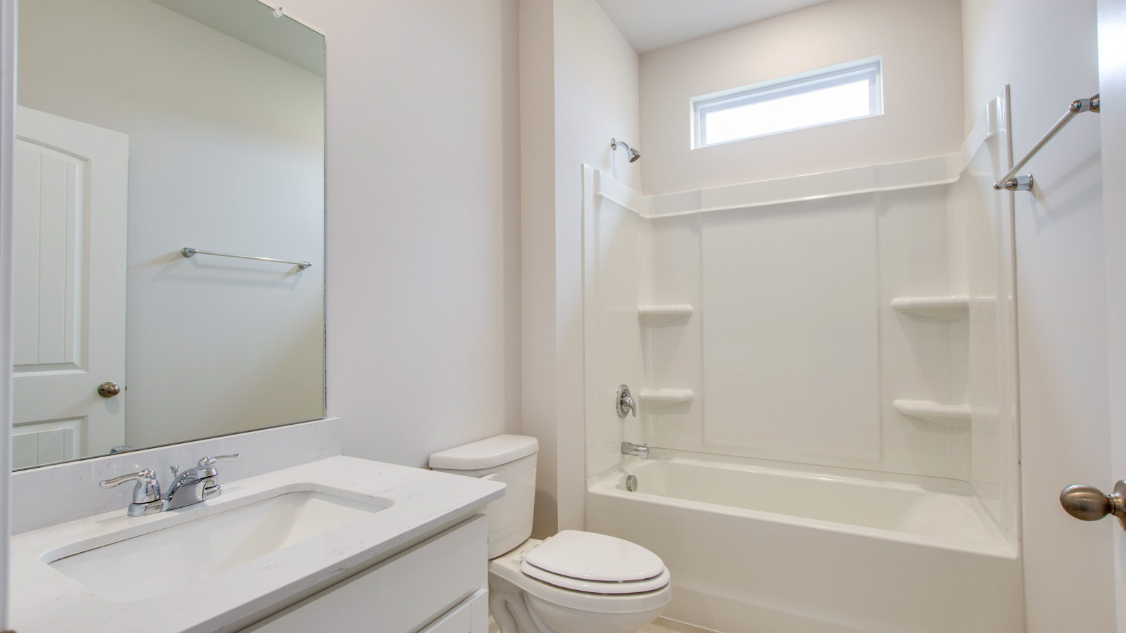 Bathroom with quartz countertops in new home