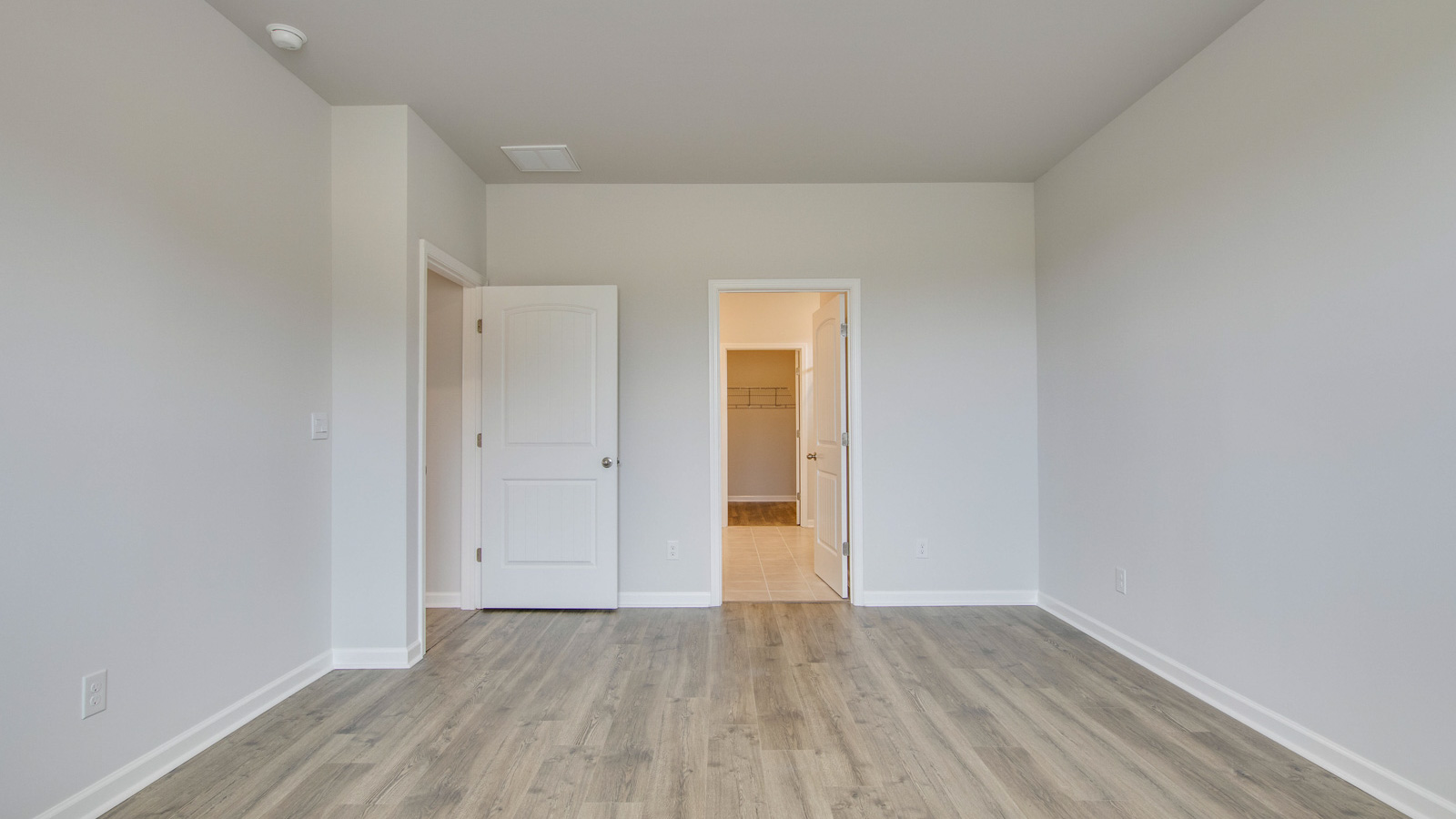 Secondary bedroom, flex-office, study, entertainment, game, craft room options in this D.R. Horton new construction home