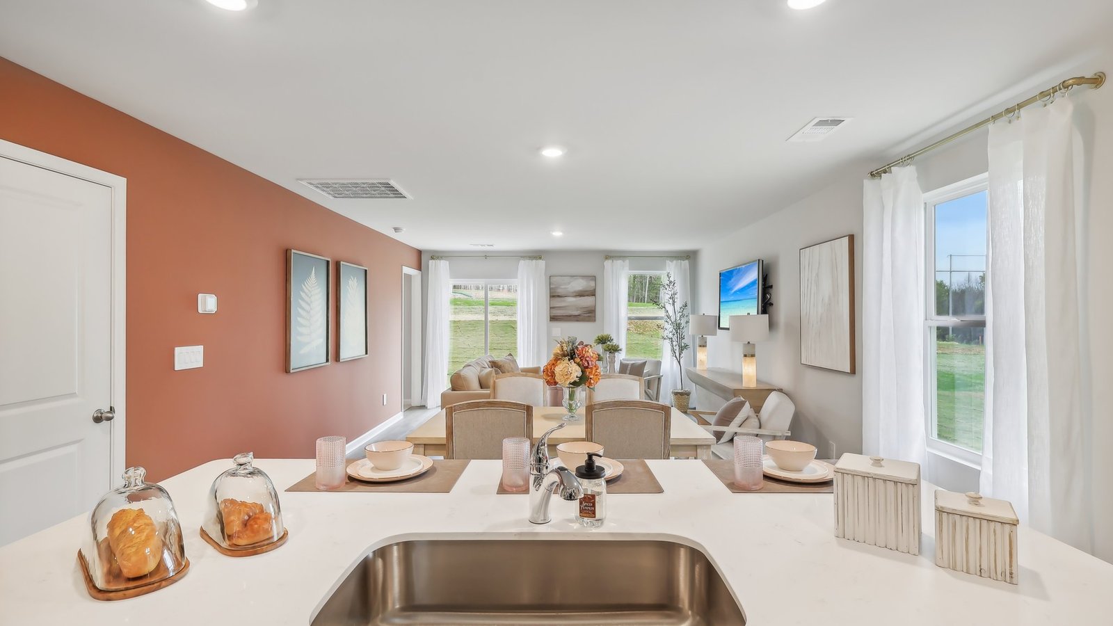 Modern kitchen with quartz countertops and stainless steel appliances