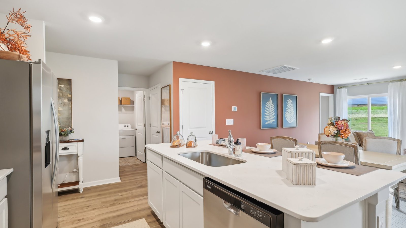Modern kitchen with quartz countertops and stainless steel appliances