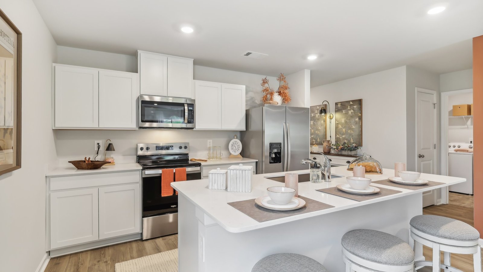 Modern kitchen with quartz countertops and stainless steel appliances
