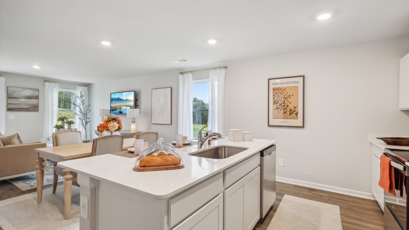 Modern kitchen with quartz countertops and stainless steel appliances