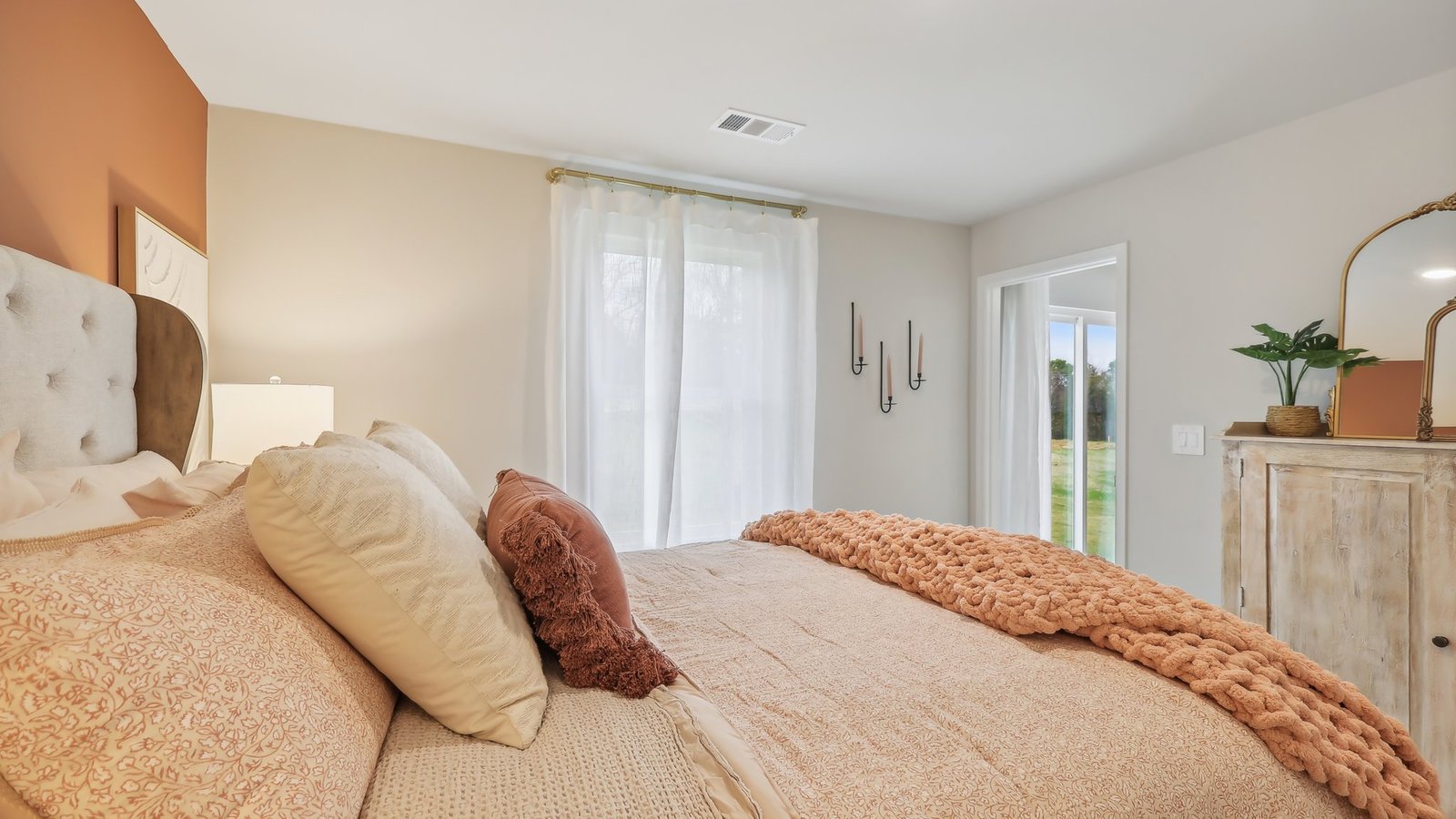 Bedroom in modern, open concept new home