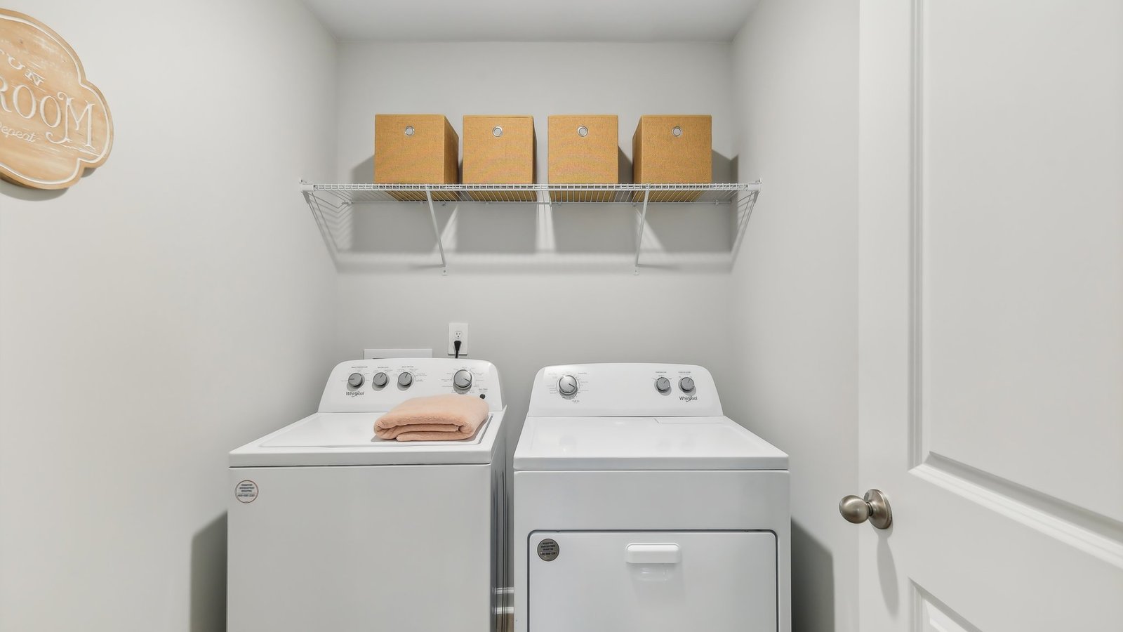 Laundry room in new single family home