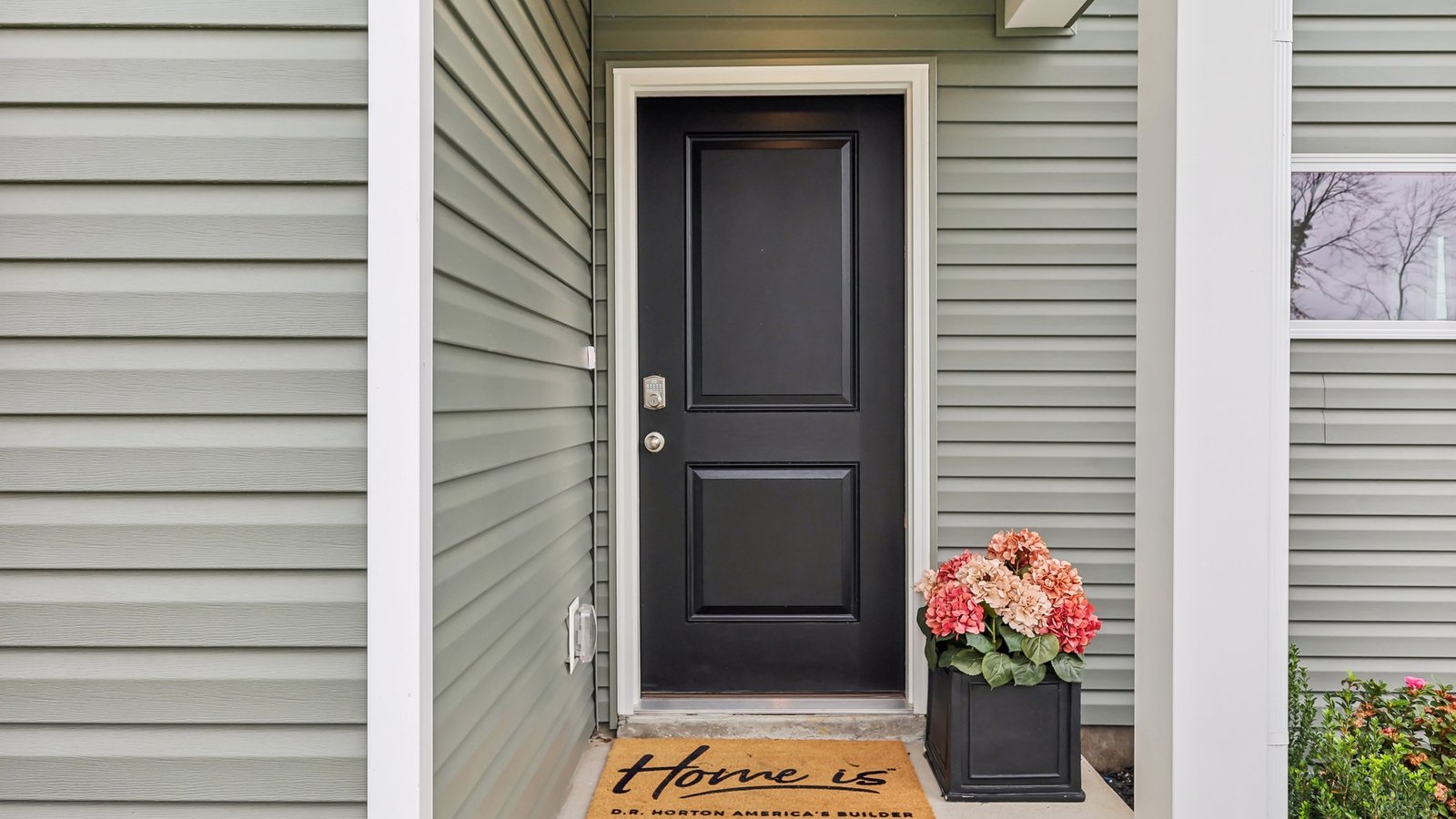 Entry to modern, open concept floorplan