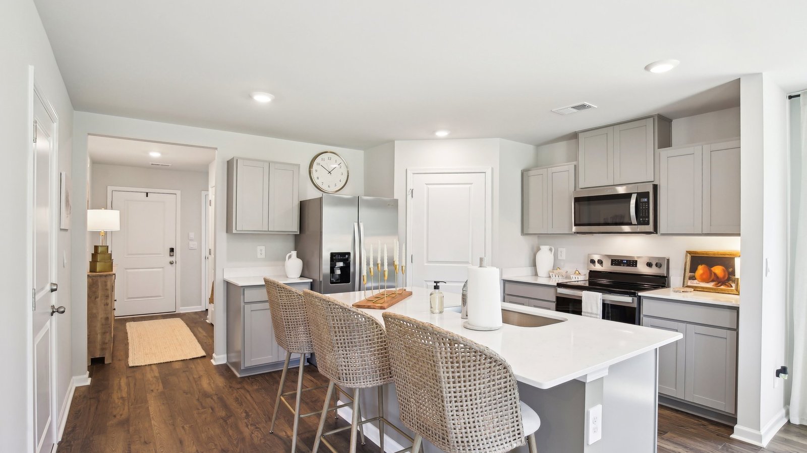 Modern kitchen with quartz countertops and stainless steel appliances