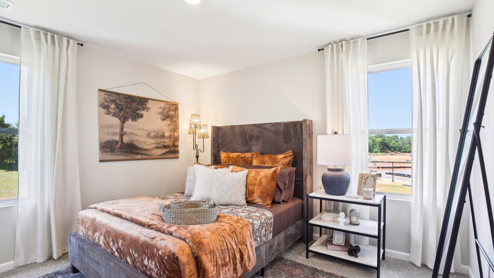 Primary bedroom in modern, open concept new build home