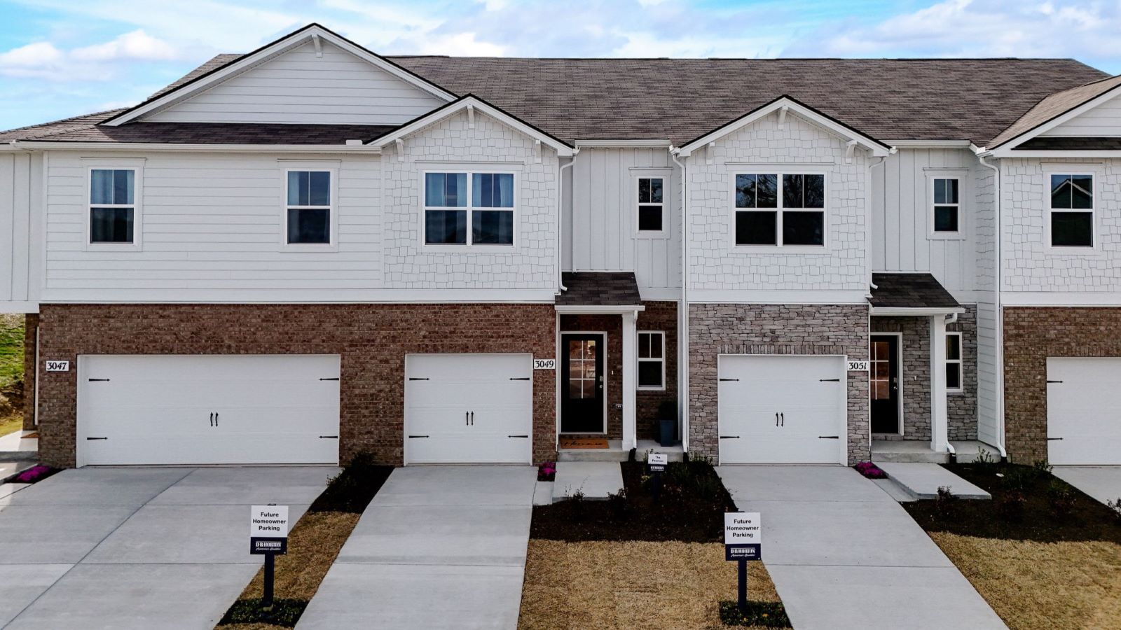 Pearson townhome front exterior with brick or stone accents