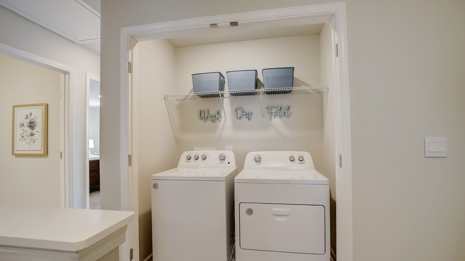 Laundry room on second floor in townhome