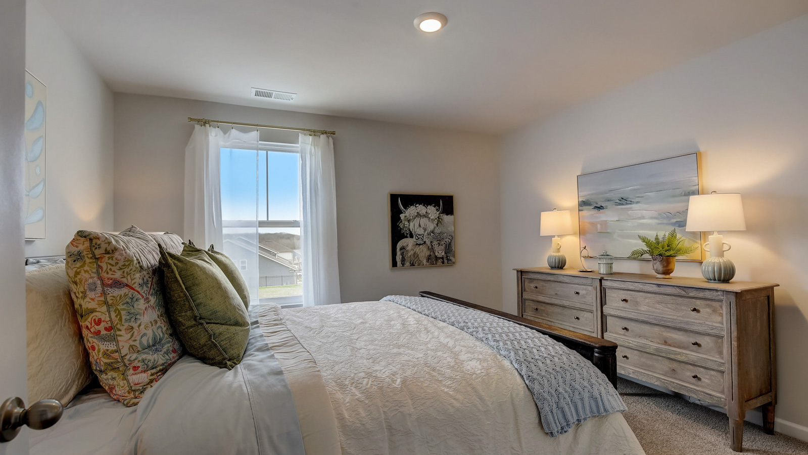 Bedroom in modern, two-story townhome