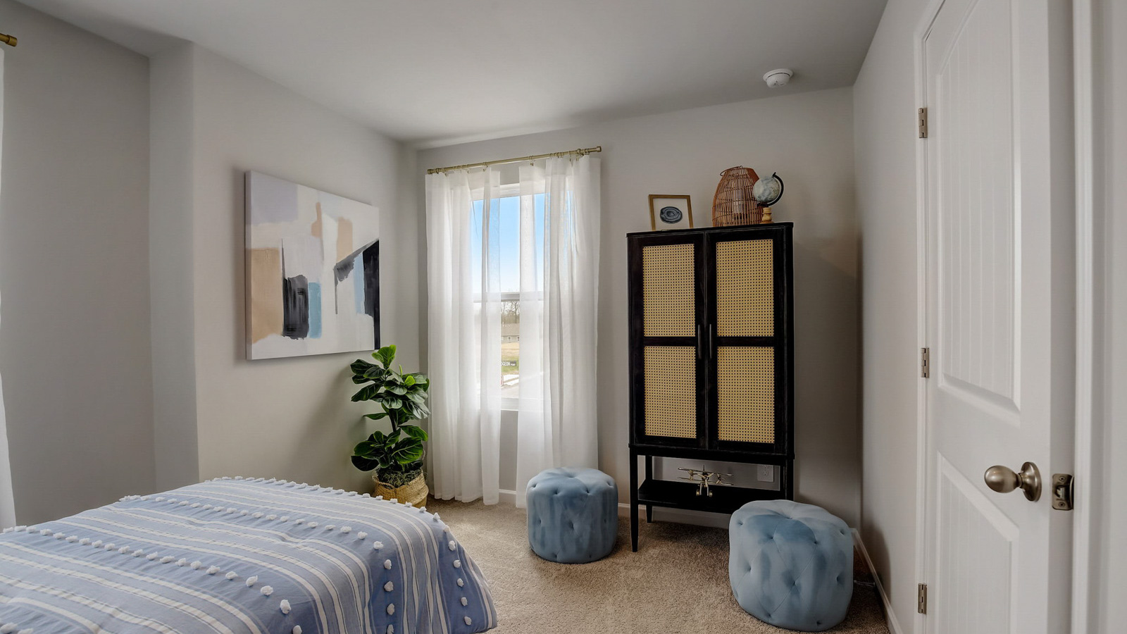 Bedroom in modern, two-story townhome