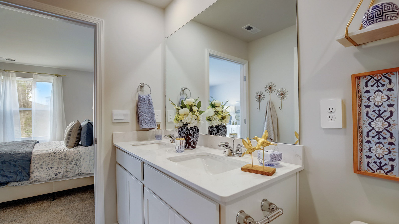 bathroom with quartz countertops in two story townhome