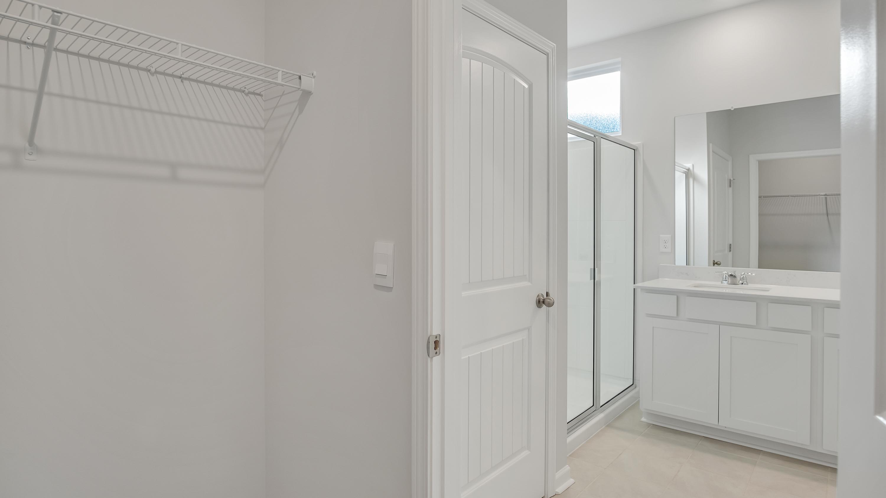 Primary bedroom in modern, open concept new build home