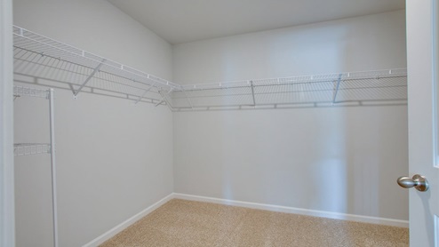 Master closet in modern, open concept new build home