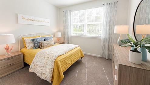 Bedroom in modern, open concept new home