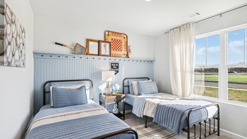 Bedroom in modern, open concept new home