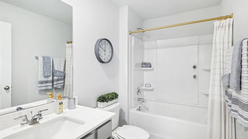 Bathroom with quartz countertops in new home