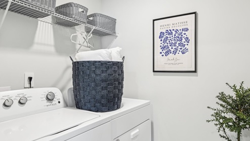 Laundry room in new single family home