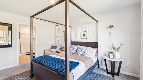 Bedroom in modern, open concept new home