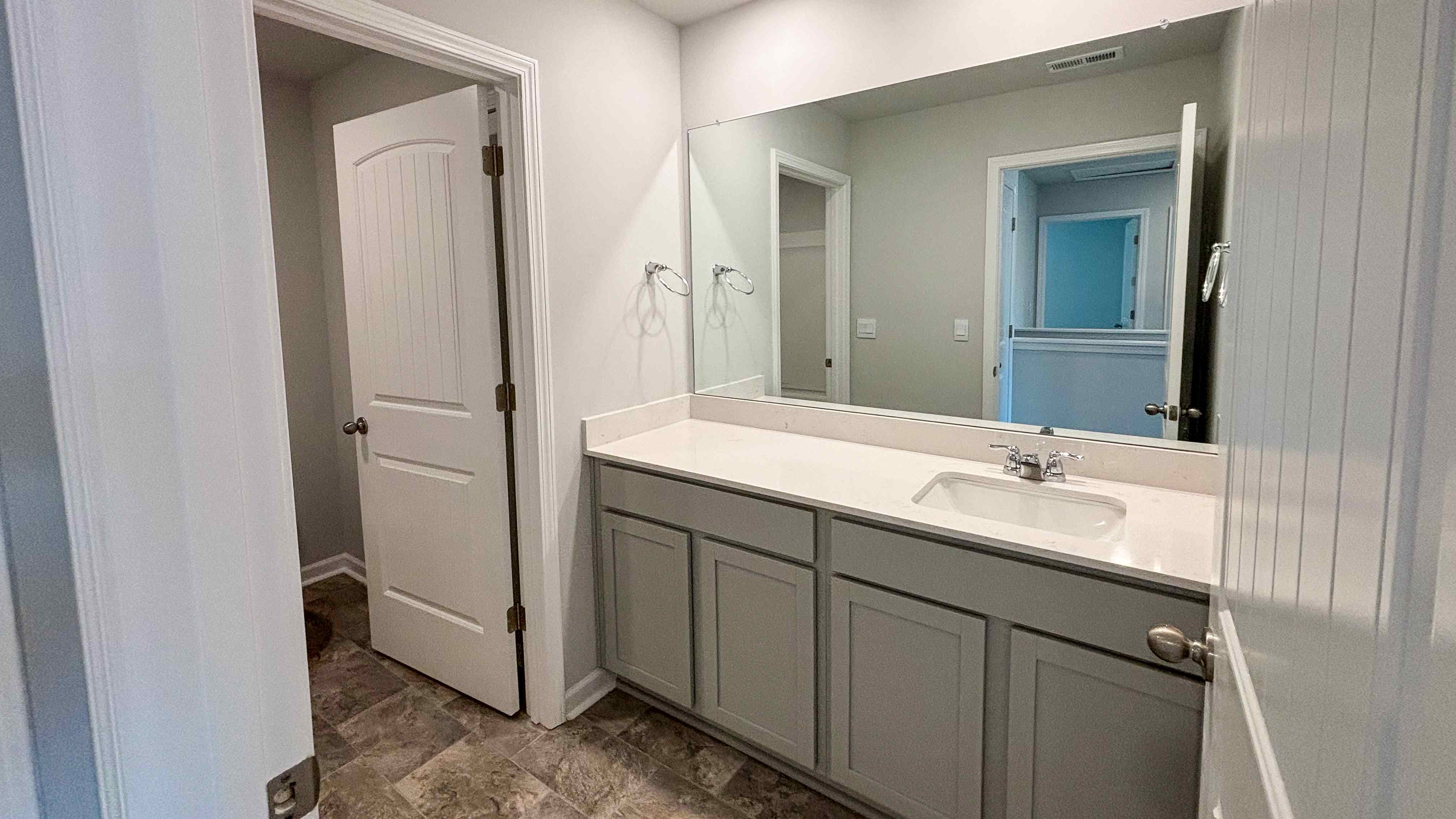 Bathroom with quartz countertops in new home