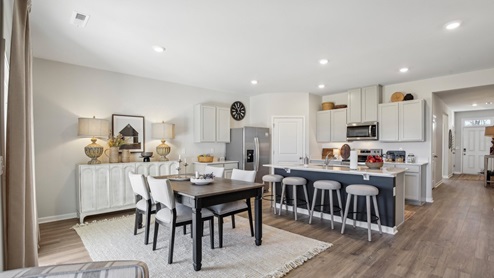 Modern kitchen with quartz countertops and stainless steel appliances